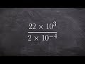 Dividing Real Numbers and Scientific Notation