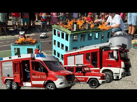 "RC Firefighters in Action: Battling Blaze at Miniature Buildings!"