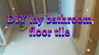 DIY laying bathroom floor tile 