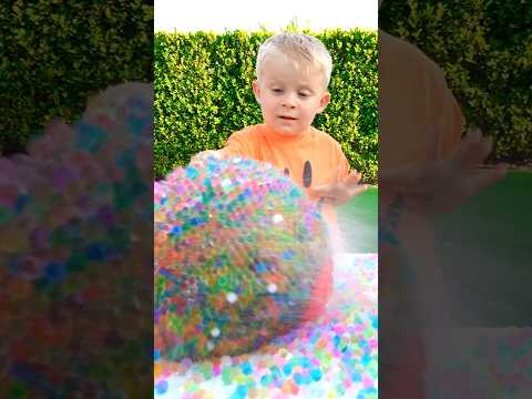 Oliver and Mom pop Giant Orbeez Balloon