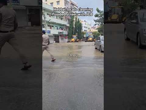 Hebbal street cleaning with JCB #bengaluru#hebbal#flood#rain #jcb#viralshort#viralvideo#shortvideo
