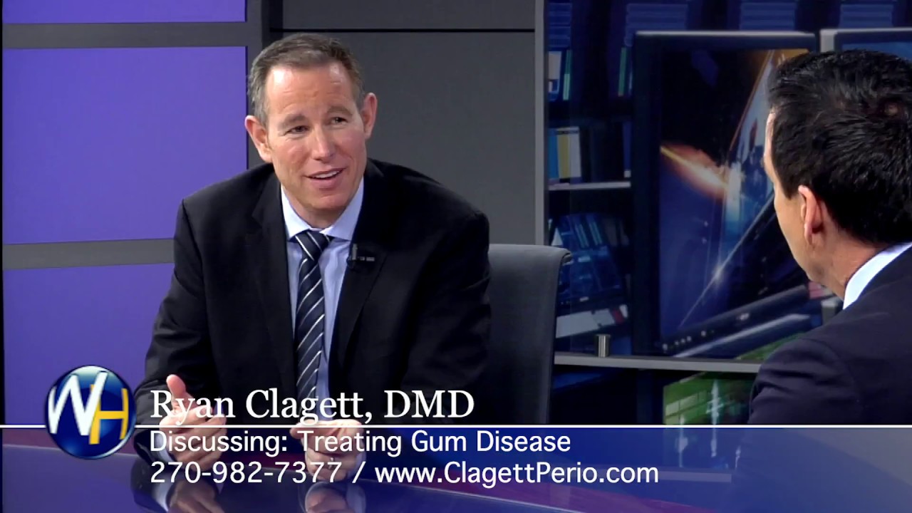 Doctor discussing gum disease treatment on set.