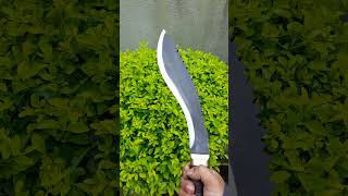 Custom khukuri with Saw Spine