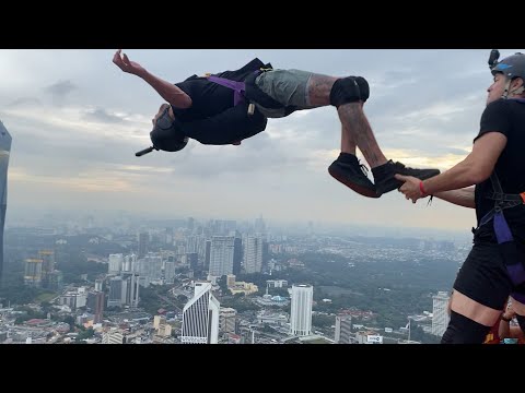 INSANE FLIPS!!! KL Tower  BASE Jumping 23'