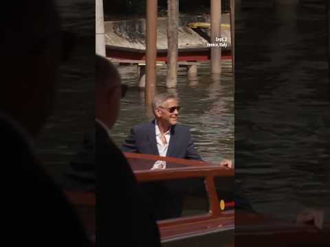 George Clooney arrives for Venice press conference