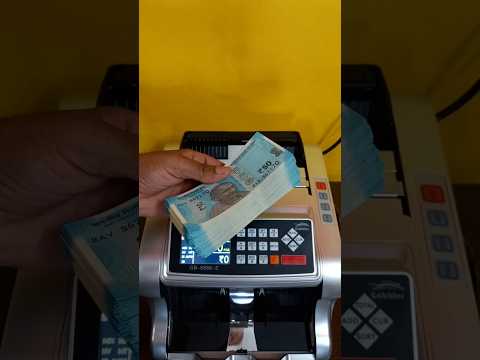 Counting Indian 50 Rupees Notes &amp; Detecting a Fake Coupon Note on a Machine 💸🇮🇳 #shorts #notes #Rs