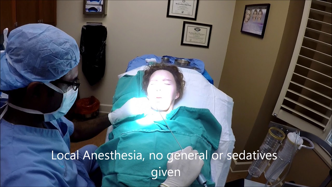 Patient receiving local anesthesia in medical setting.