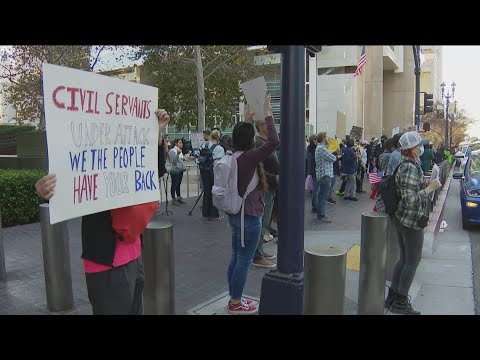 People gather downtown San Diego protesting over Trump administration's new policies