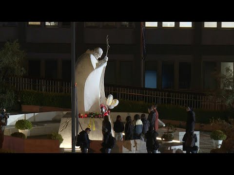 People pray outside Rome's Gemelli hospital as Pope's condition 'remains critical' | AFP