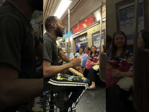 Amazing Drum Performance on the New York City MTA Subway Train