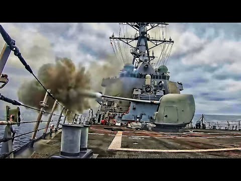 U.S. Navy Destroyer Fires Its Weapons