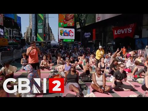 WATCH: Yogis practice their craft in New York's Time Square