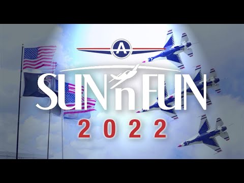 Sun N Fun 2022 Logo with American Flags and Blue Angels in the background