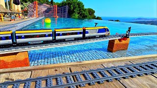 Lego train around the Pool and 2 Bridges FPV (4K)