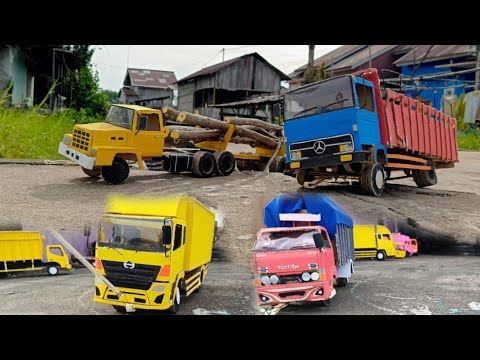 Truk Nissan Tua pengangkut kayu Tersangkut di jalan Rusak😭