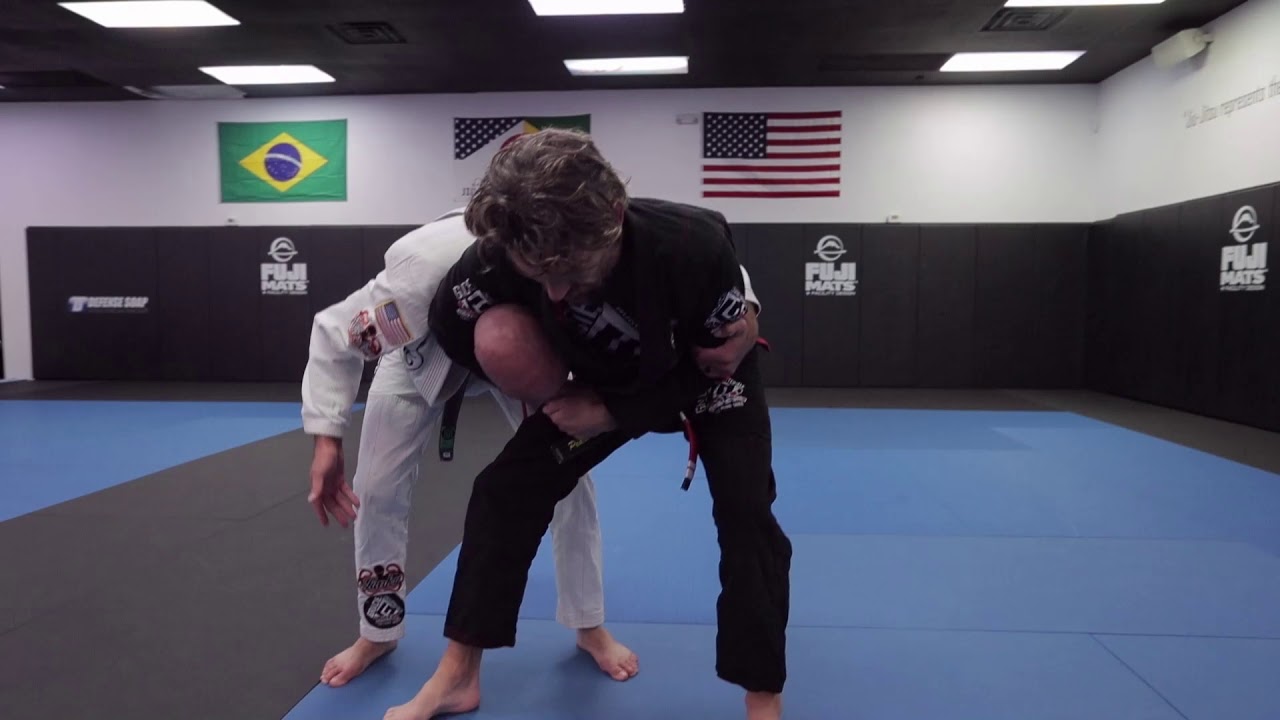 Headlock defense (attacker bent over)