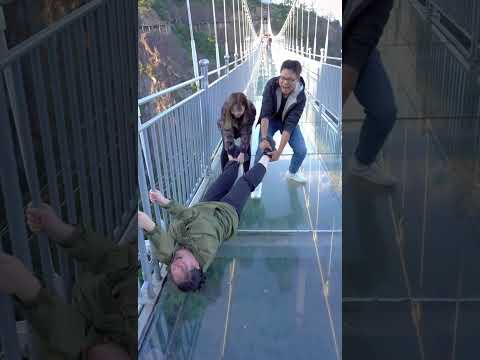 Afraid of glass bridge🤣#afraid #glass #glassbridge #youtube #foryou  #funny