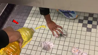 PEEING ON STRANGERS IN BATHROOM PRANK