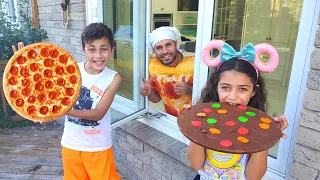 تتعلم هايدي وزيدان كيفية صنع البيتزا