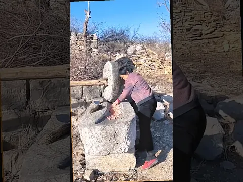 Traditional chinese peanut crushing