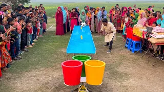 ঘুড়ন্ত বালতিতে বল গড়িয়ে বিনামুল্য প্রয়োজনীয় উপহার জেতার চ্যালেঞ্জ। নতুন গ্রামে খেলা দেখতে ভিড় করলো