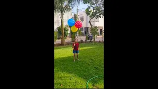 Ayaansh Playing With Balloon