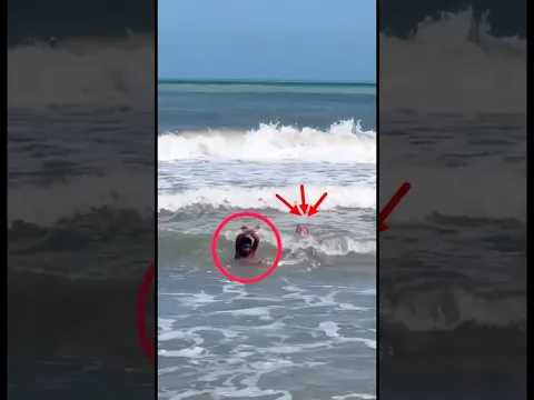 Double Rescue Of People At The Beach By Coast Life Guard