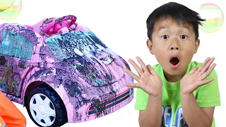 Adam and Austin play with toy car