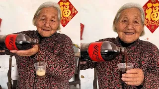 Grandma is amazing! She poured Coke while suspended in mid-air!