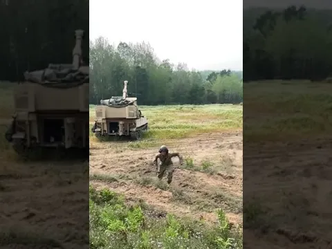 Soldier uses cord to fire tanker cannon