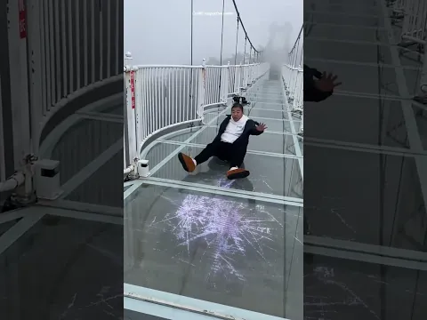 look The child start cry as soon as he reache the glass bridge