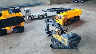 Excavator help Car accident rescue by a car crash on the road