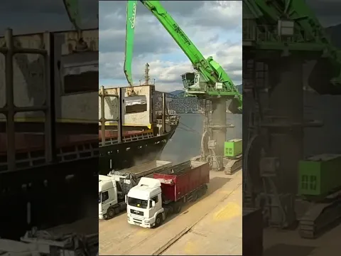 Unloading Cargo Ship with Excavator Crane