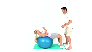 Image Crunch avec réception et lancer sur ballon de stabilité