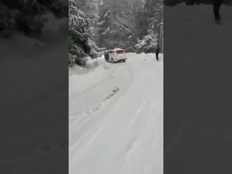 Car slide out of control on icy road