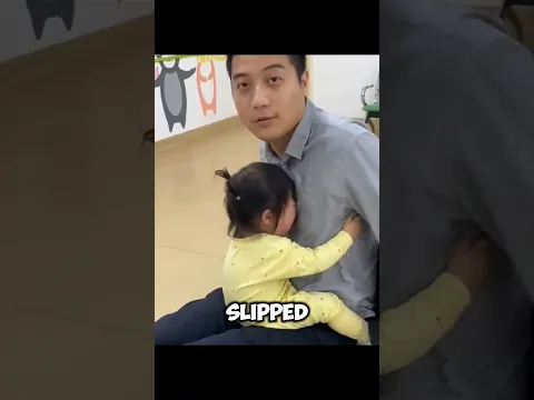 The father comforted his young daughter..
