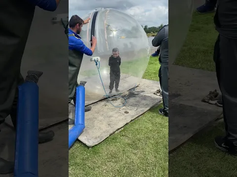 My brother @DragonBloxx213  getting in a Zorbing ball #holidayswithshorts #zorbing