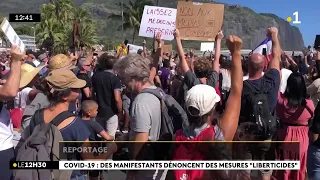 Coronavirus : ils manifestent contre les mesures annoncées, en marge de la cérémonie du 14 juillet