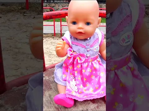 Baby Born playing on the playground