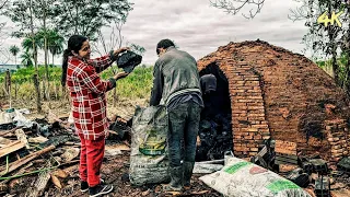 Primitively making charcoal in a kiln on a cold morning 4K