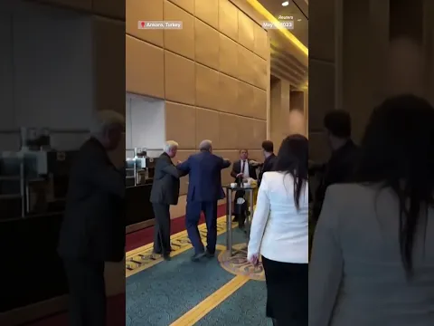 A Ukrainian delegate punched a Russian delegate after he grabbed the #Ukraine flag at a summit