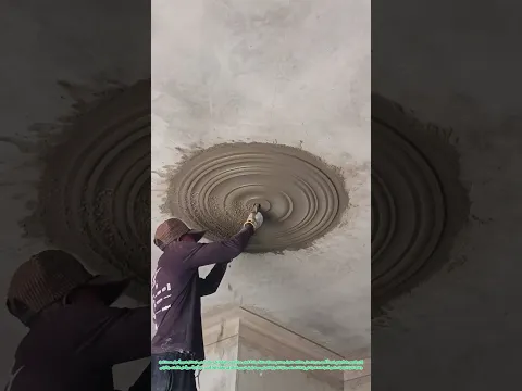 المعجونة الرمادية تُشكل القبة: كيفية صناعة الزخارف المعمارية على السقف باليد الماهرة