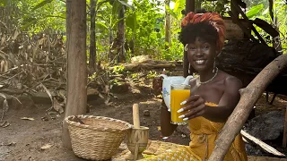 Making mango juice without a machine in a Ugandan village