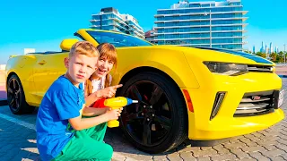 Dani Helps Fix a Yellow Car Wheel 🚗