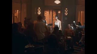 Spotted: Gracie Abrams lighting up a Parisian café.