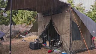 Tent Camping With Truck In Freezing Storm
