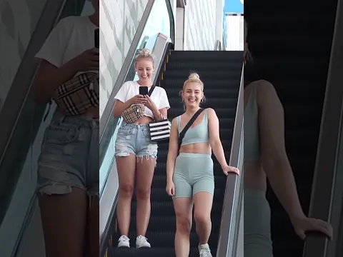 Touching hands on the escalator prank