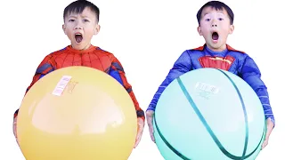 Adam and Austin play with colorful balls