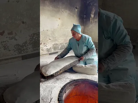 Baking Armenian lavash bread in traditional way