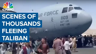Chaotic scenes at Kabul airport as thousands flee Taliban